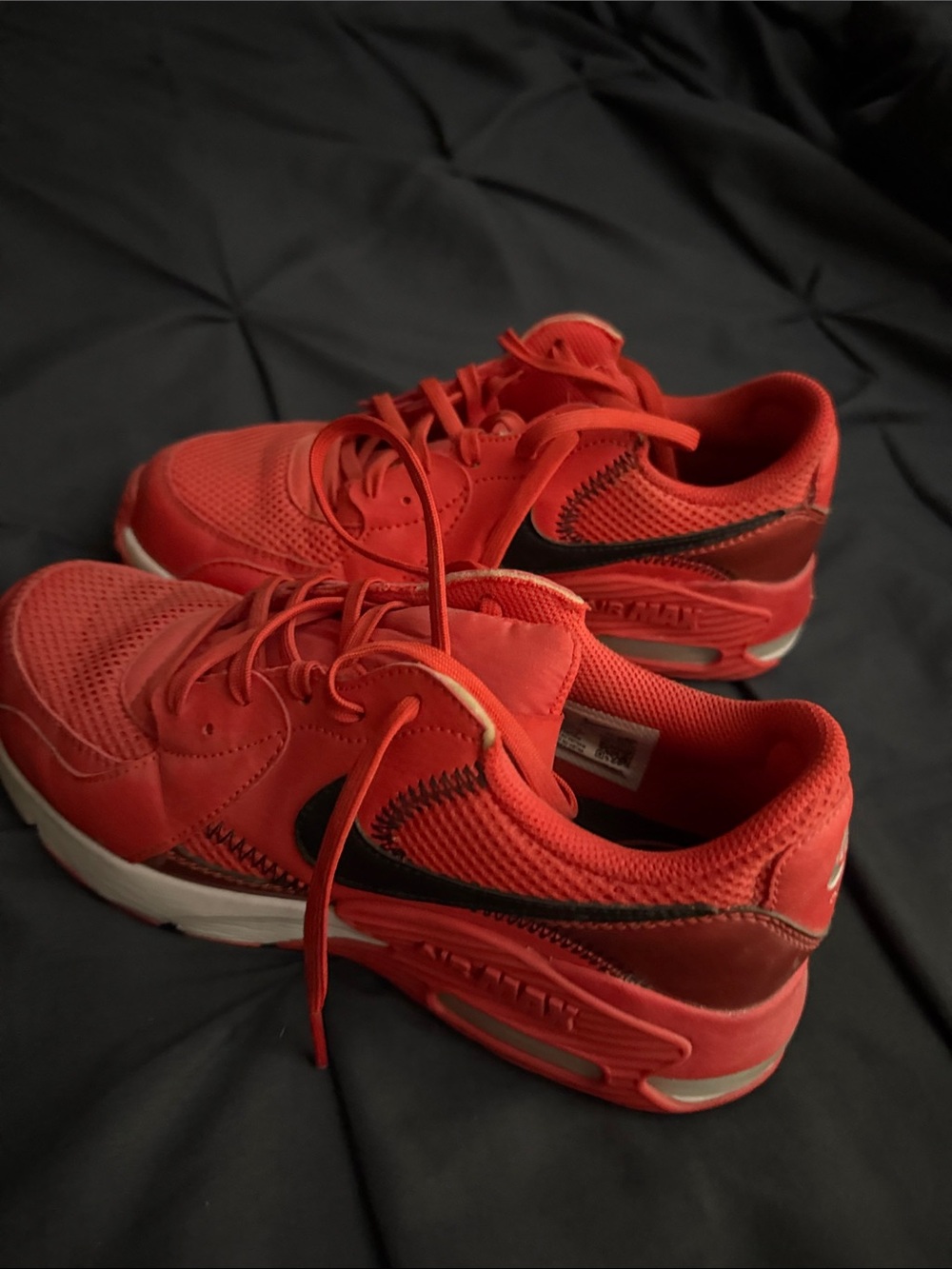 Nike women’s  Red Sneakers with Black Swoosh